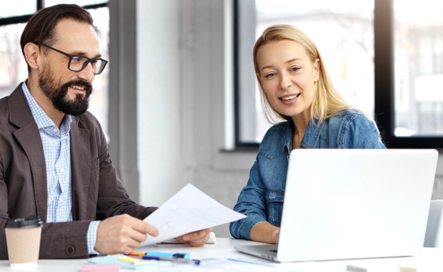 Financial analysis workspace with documents and charts